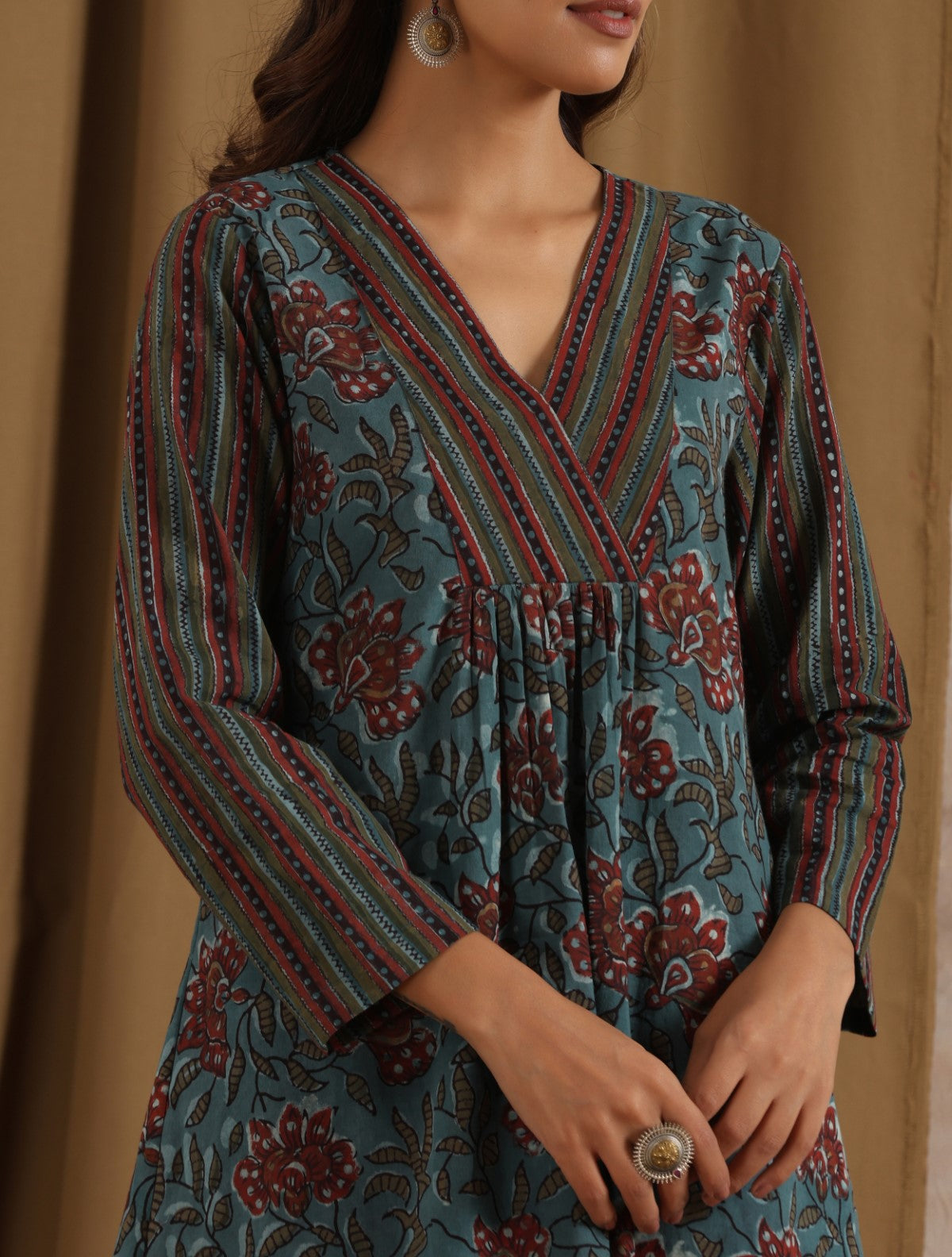 Prajakta- Blue floral striped kurta set with yoke