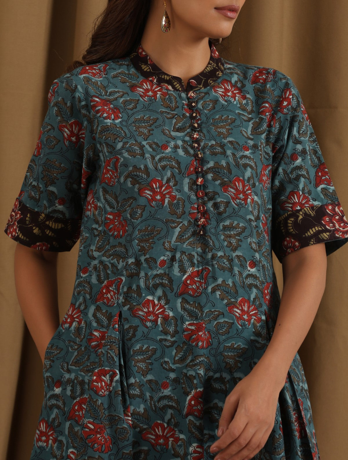 Gagan- Blue floral kurta with box pleat and matching stripe pants