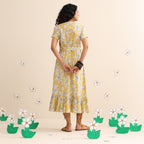 Yellow blossom wrap dress