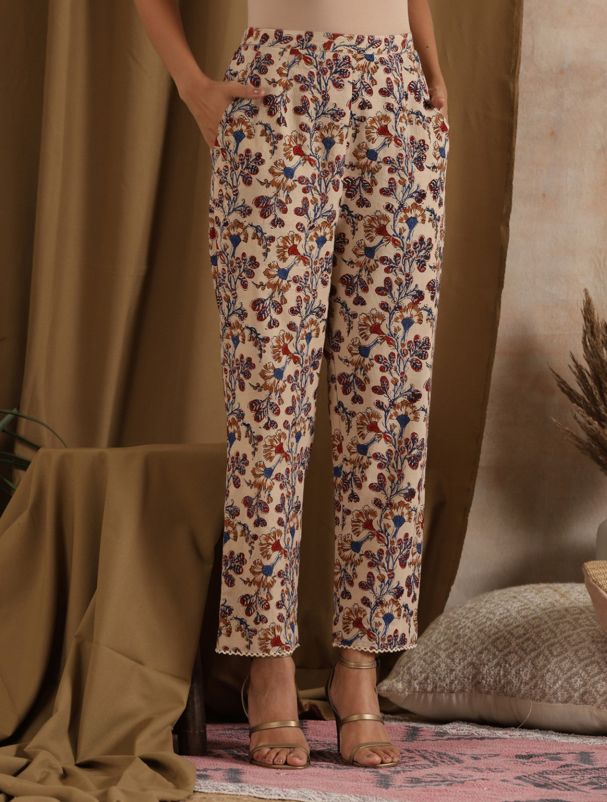 Pariza-  Cream floral kurta with ruffled sleeves and matching pants