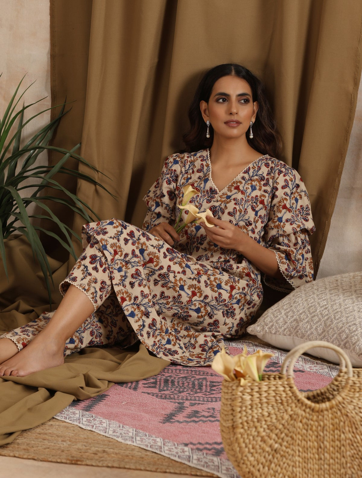 Pariza-  Cream floral kurta with ruffled sleeves and matching pants