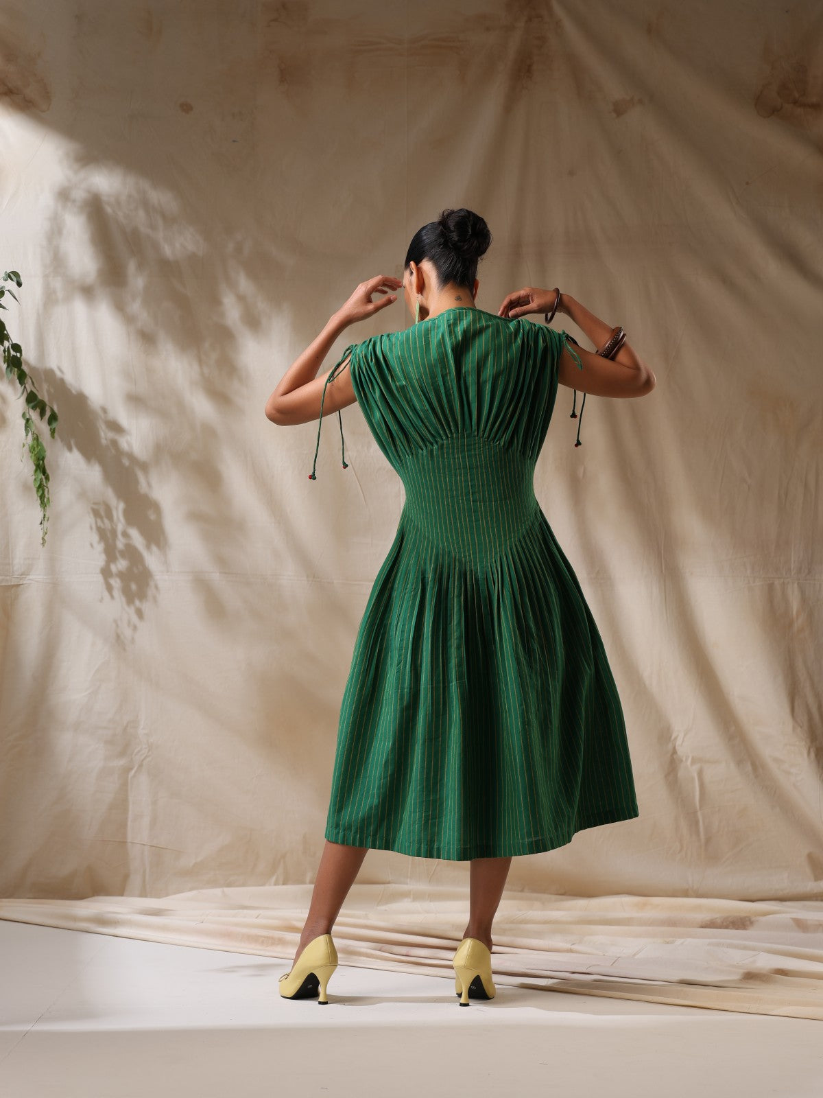 Kairi - Green striped front pleated dress