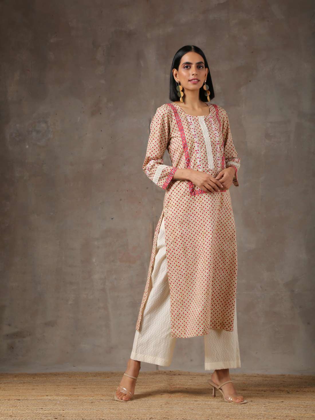 Floral printed kurta with double border yoke and cream textured pants - Label Raasleela